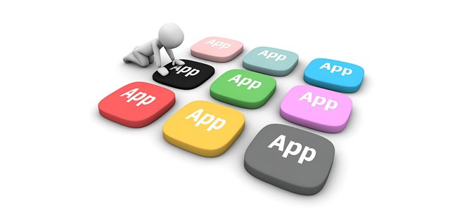 En grafisk illustraion som visar nio olikfärgade knappar, på varje knapp står det App. En figur trycker på en av knapparna.