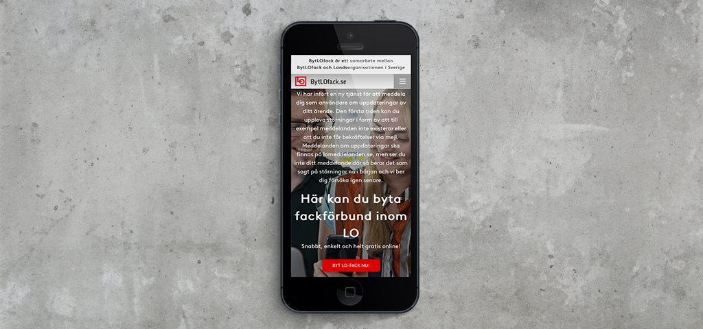 En mobil mot en grå bakgrund